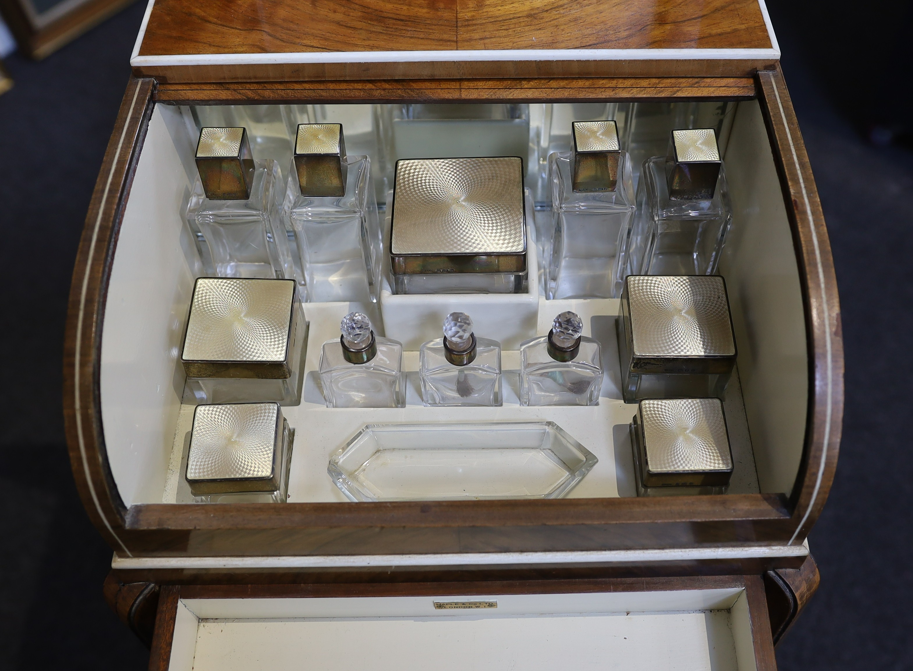 An Art Deco Maple & Co walnut and ivory beaded necessaire poudreuse table, c.1934